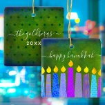 Hanukkah Menorah Candle Script Name Green Keepsake<br><div class="desc">“Happy Hanukkah.” A playful, modern, artsy illustration of boho pattern candles helps you usher in the holiday of Hanukkah in style. Assorted blue candles with colorful faux foil patterns overlay a rich, deep green textured background. On the back, personalize with your family name and year, over a tiny dark green...</div>