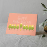 Hanukkah Menorah Olives, Peach Folded Group Card<br><div class="desc">Light up someone's Hanukkah in a fun-loving way! This festive folded card showcases a group of cheerful olive characters who join forces (and flames!) to create a menorah — with the playful message “Happy Hanukkah” (on the front) and "from olive us" (when the card is opened). A fun way for...</div>