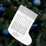Hanukkah Menorah Silver Tone Elegant Modern<br><div class="desc">Personalise this elegant and modern style Hanukkah Menorah stocking by adding a name in white to the silver tone "cuff" design. The design is sleek and simple with my original square style Menorah in faux silver on white and a simple yet interesting font for the name. Whether you celebrate Chanuka...</div>