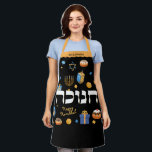 Hanukkah Personalised Hebrew Menorah Dreidel  Apron<br><div class="desc">Set a Happy Hanukkah tone with this Personalised Bold & Bright Hanukkah Apron. Sure to make someone special smile. It is the perfect way to wish friends and family a Happy Hanukkah. Whimsical colourful Chanukah elements — including Jelly Doughnuts, Dreidels, Wrapped Gifts, Gold Coins and Stars of David— surround the...</div>