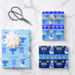 Hanukkah Snowman Monogram Holiday Assortment Wrapping Paper Sheet<br><div class="desc">Create your own custom Hanukkah wrapping paper sheets with your monogram initial and my festive holiday snowman in a dark blue scarf and matching Yamuka. Featuring space for your custom message and monogram, this gift wrap assortment comes in three different designs: one on light blue, one on medium blue and...</div>