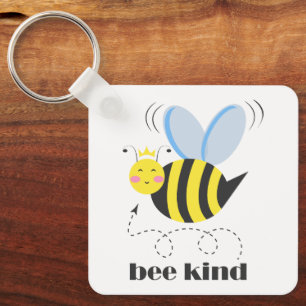 Happy bee princess with crown and slogan Bee Kind Key Ring
