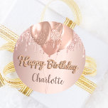 Happy Birthday rose gold blush glitter balloons Classic Round Sticker<br><div class="desc">A sticker for a girly and glamourous birthday party.  A faux rose gold metallic looking background with an elegant faux rose gold and pink glitter drips,  paint drip look and balloons.  The text: Happy Birthday is written with a golden balloon style font.  Personalise and add a name.</div>