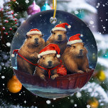 Happy Capybara Christmas  Ceramic Tree Decoration<br><div class="desc">This design may be personalised by choosing the Edit Design option. You may also transfer onto other items. Contact me at colorflowcreations@gmail.com or use the chat option at the top of the page if you wish to have this design on another product or need assistance. See more of my designs...</div>
