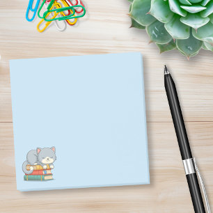 Happy Cat on top of a Book Stack Blue Post-it Notes