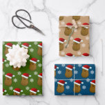 Happy Christmas Potatoes Wrapping Paper Sheet<br><div class="desc">Adorable collection of wrapping paper featuring a happy smiling Christmas Potato wearing a Santa hat and white snowflakes dotted around on a various background colours.</div>