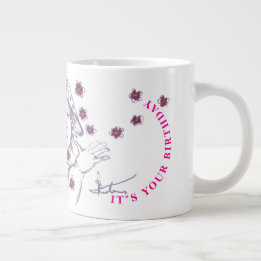 Happy cute little girl drawing large coffee mug