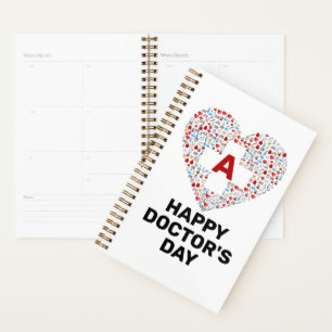 Happy doctors day with medical heart monogram planner