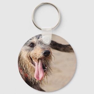 Happy dog on a beach key ring