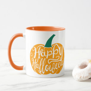 Happy Halloween lettering on carved pumpkin Mug