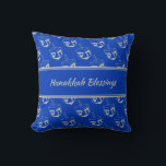 HAPPY | HANUKKAH BLESSINGS | Dreidel BLUE Cushion<br><div class="desc">Mid blue THROW PILLOW to celebrate HANUKKAH. Blue and silver grey colour theme with all over DREIDEL print. There is customisable placeholder text on the front which says HANUKKAH BLESSINGS and on the back so you can personalise with your own greeting and/or name. Other versions available in the HANUKKAH Collection...</div>