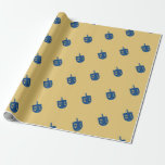 Happy Hanukkah Blue Dreidels on Elegant Golden Wrapping Paper<br><div class="desc">Happy Hanukkah. This design represents beautiful blue dreidels on elegant golden background celebrating the historical holiday of Hanukkah. It is the perfect wrapping paper for Hanukkah,  aka Chanukah,  or other special occasions.</div>