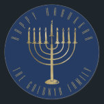Happy Hanukkah 'Blue Gold Menorah Holiday Classic Round Sticker<br><div class="desc">This sticker features a gold coloured menorah on a navy blue background. The message above it reads "Happy Hanukkah". Below the menorah is a place for your family name which you may personalise or remove if you'd like.</div>