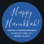 Happy Hanukkah blue white script return address Classic Round Sticker<br><div class="desc">Happy Hanukkah modern custom script calligraphy name and address personalised Hanukkah return address stickers.
Fully customisable white text,  blue background.
Elegant,  simple,  modern design.</div>