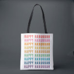 Happy Hanukkah | Simple Rainbow Colours Typography Tote Bag<br><div class="desc">Celebrate the festive season with this vibrant "Happy Hanukkah" tote bag! Featuring the cheerful phrase repeated in a rainbow of colours, this design brings joy and warmth to your Hanukkah celebrations. Ideal for carrying gifts, groceries, or holiday essentials, this bag is both stylish and practical. It’s a thoughtful gift for...</div>