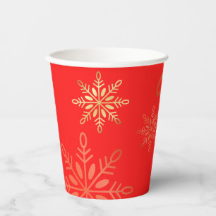 Happy holidays gold ornaments, snowflakes red paper cups