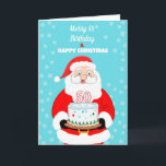 Happy Merry 50th Birthday Christmas Santa  Card<br><div class="desc">Celebrate a 50th Christmas birthday with festive cheer! This joyful card features Santa Claus holding a decorated birthday cake topped with a bold “50.” Blending the wonder of Christmas with the excitement of a milestone birthday,  it’s the perfect way to share holiday sparkle and birthday happiness all in one.</div>