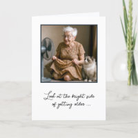 Happy Old Lady Cooling Off By a Fan