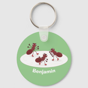 Happy red ants ice skating cartoon key ring