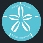 Happy Seashore | Beach Sand Dollar Christmas Classic Round Sticker<br><div class="desc">Beach theme envelope seals feature a tropical turquoise blue and white sand dollar seashell and two lines of text that can be personalised with your preferred holiday greetings (shown with "Warmest Wishes and "Merry Christmas"). Perfect for beach,  tropical,  island,  nautical and coastal Christmas themes. Original artwork KL Stock.</div>