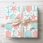 Happy Seashore | Nautical Beach Pattern Christmas Wrapping Paper<br><div class="desc">Beach theme Christmas gift wrap features a nautical pattern of seashells and whale tails in tropical turquoise and coral. Original artwork KL Stock.</div>
