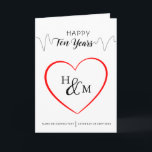 Happy Ten Years Elegant Monogram Heart Anniversary Card<br><div class="desc">Mark ten years of love with this elegant anniversary card, featuring 'Happy Ten Years' in a calligraphy style and elegant monogram heart. The design captures the significance of the milestone with a timeless, modern look, perfect for honouring love and commitment. This card is an ideal keepsake for couples looking back...</div>
