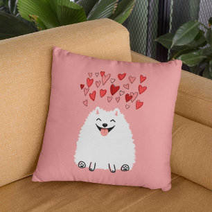 Happy White Pomeranian Dog with Pink Hearts Cushion