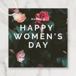 Happy women's day text on floral favour tags