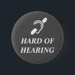 Hard Of Hearing White On Dark Grey 6 Cm Round Badge<br><div class="desc">International Symbol for the Deaf with the words HARD OF HEARING in white on a dark grey background.</div>