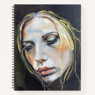 Hardcover notebook of a sad woman