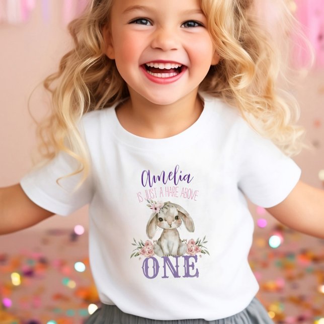 Hare Above One First Birthday Shirt (Happy toddler wearing first birthday shirt. ai generated model)