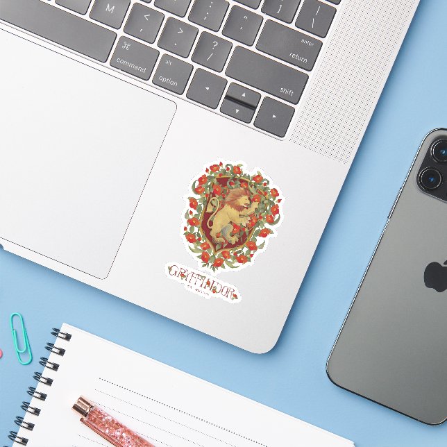 HARRY POTTER™ | GRYFFINDOR™ Crest (Laptop w/ iPhone)