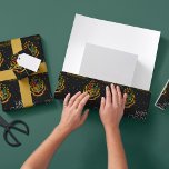 Harry Potter | Hogwarts Crest - Happy Christmas Wrapping Paper<br><div class="desc">Ever dream of being in Gryffindor? Wish you could be in Ravenclaw? What about sorting into Slytherin or Hufflepuff? Even we everyday Muggles can be part of the magic of Harry Potter with this colorful crest design from Hogwarts. Inspired by the J.K. Rowling kids series, embrace the magic within and...</div>