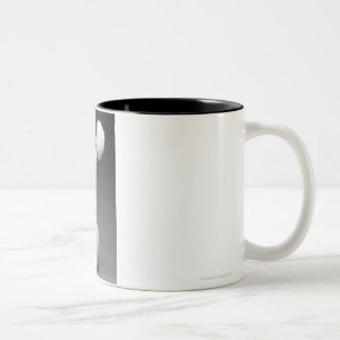 Haunches of Poodle, on grey background Two-Tone Coffee Mug