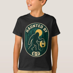Haunted By 6-7 Bigfoot Lantern Halloween Badge T-Shirt