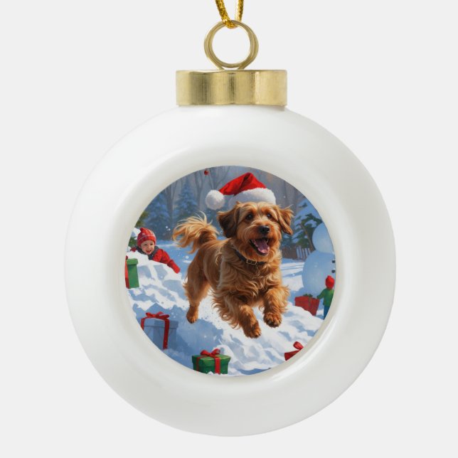 Havanese Running in Snow with Christmas Hat Ceramic Ball Christmas Ornament (Front)