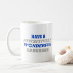 Have a Pawsitively Wonderful Hanukkah Coffee Mug<br><div class="desc">This delightful design showcases the heartfelt text "Have a pawsitively wonderful Hanukkah." The text is presented in blue and silver colours, with the letter "o" in "wonderful" playfully substituted with a paw print. This design captures the joy and celebration of Hanukkah with a pet-friendly twist. The combination of blue and...</div>