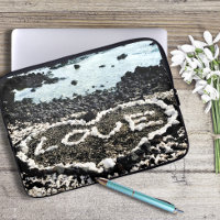 Hawaii black sand beach and coral love heart photo