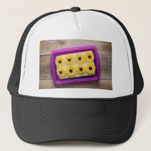 Hawaii slices with pineapple on rustic wood trucker hat