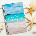 Hawaii Tropical Beach Photo Peace Love Sandy Feet Planner<br><div class="desc">“Peace, love & sandy feet.” Remind yourself of the fresh salt smell of the ocean air whenever you use this stunning, vibrantly-coloured photo of a turquoise blue ocean and sandy beach, custom name yearly planner. A graphic light blue sun icon pattern overlays vibrant ocean turquoise blue on the back. This...</div>