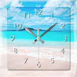 Hawaii turquoise blue ocean and sandy beach photo square wall clock<br><div class="desc">Remind yourself of the fresh salt smell of the ocean air whenever you check the time on this stunning, vibrantly-coloured photo wall clock. Exhale and explore the solitude of an empty Hawaiian beach. Your choice of a round or square clock face. Makes a great housewarming gift! You can easily personalise...</div>