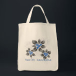 Hawaiian Holly Hanukkah Blue Floral Tote Bag<br><div class="desc">Hau’oli Hanukaha is Hawai'ian for Happy Hanukkah! This illustration showcases a tropical interpretation of holly in Hanukkah colours and subtle gradients. The lettering is dusted with snow for an added surprise. For that special chef in your life,  this original illustration is shown here on the cotton grocery tote.</div>