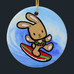 Hawaiian Surfing Bunny Holiday Cartoon Ceramic Tree Decoration<br><div class="desc">There is nothing better than a tropical vacation during the winter holidays! And even better, our adorable surfing bunny, Coco takes on the big waves on the North Shore of Oahu, Hawaii. He brings with him the Aloha sprit for the holidays and wishes you a "Mele Kalikimaka" (Merry Christmas). This...</div>