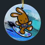 Hawaiian Surfing Bunny Holiday Cartoon Ceramic Tree Decoration<br><div class="desc">There is nothing better than a tropical vacation during the winter holidays! And even better, our adorable surfing bunny, Coco takes on the big waves on the North Shore of Oahu, Hawaii. He brings with him the Aloha sprit for the holidays and wishes you a "Mele Kalikimaka" (Merry Christmas). This...</div>