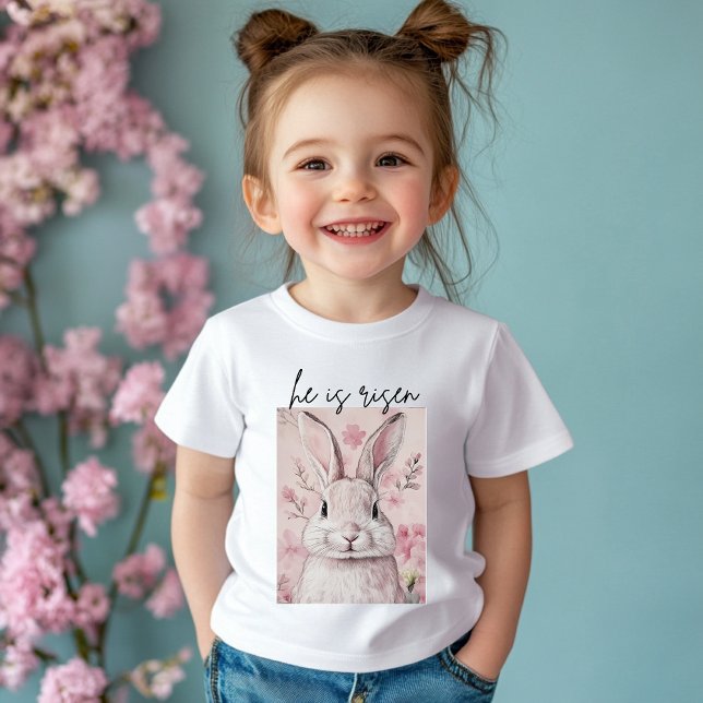 "He is Risen" Pink Bunny with Flower Baby T-Shirt (Creator Uploaded)