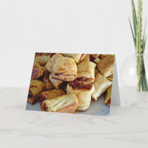Heaps of sausage rolls card