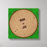 Heart Carved Initials Wood Tree Rings Personalised Canvas Print<br><div class="desc">This beautiful, romantic rustic nature stretched canvas design is perfect for a wedding, anniversary or Valentine's Day. It has a wood texture look, like the top view of a tree stump complete with rings and a bark border. A heart with arrow has been carved into it. Use the template field...</div>