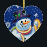 Heart Christmas tree decoration Snowman & tinsel.<br><div class="desc">Heartshape blues Christmas tree decoration Snowman and tinsel.deep blues.
This jolly snowman is about to decorate his tree with colorful tinsel.
See the other characters in this same series,  Santa and Polar Bear and Rudolph.</div>