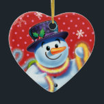 Heart Christmas tree decoration Snowman & tinsel.<br><div class="desc">Heartshape pinks Christmas tree decoration Snowman and tinsel.pinks.
This jolly snowman is about to decorate his tree with colorful tinsel.
See the other characters in this same series,  Santa and Polar Bear and Rudolph.</div>