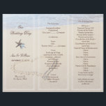 Heart in Sand Wedding Program Template<br><div class="desc">Heart in sand wedding program template. Fold in thirds to create a unique and beautiful beach theme wedding program. Easily customise using the template text lines provided. Two starfish decorated the front third which has four templates using brown text. Ocean water can be seen at the top lapping against the...</div>